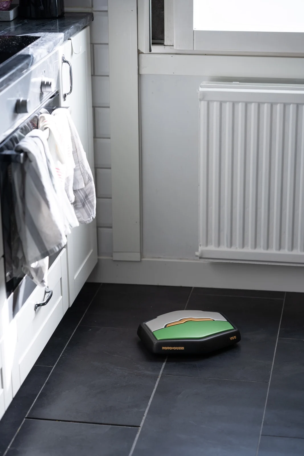 Moto Guzzi robot vacuum prototype shown in context